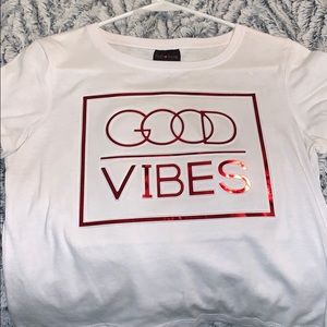 White top with the words good vibes!